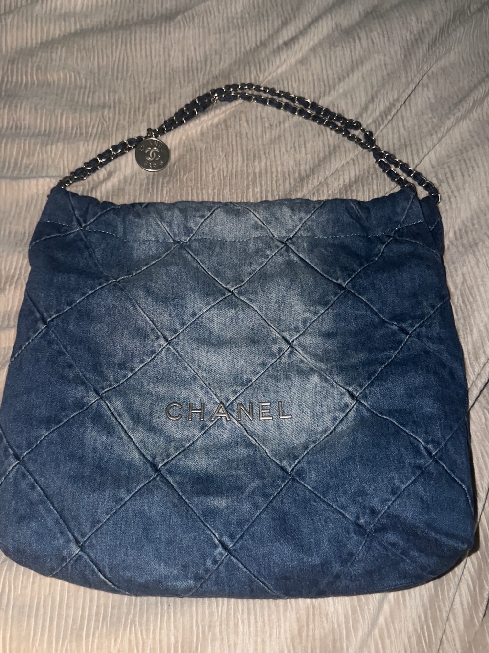 CHANEL Quilted Denim 22 Shoulder Bag in Blue with Silver Chain
